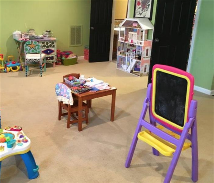 The same playroom with clean and dry carpet