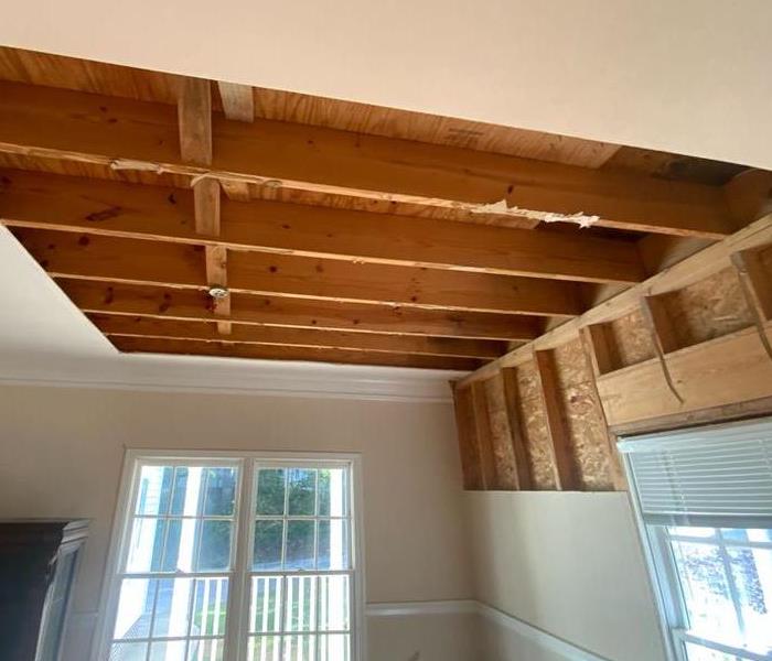 living room ceiling post water mitigation services