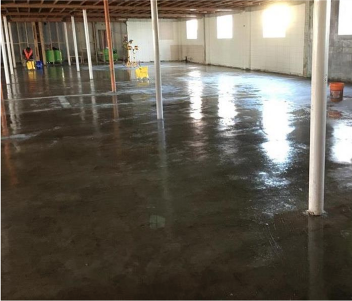 Concrete floors covers in about an inch of water