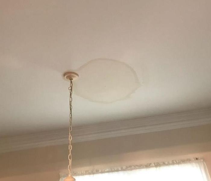 living room ceiling pre water mitigation services