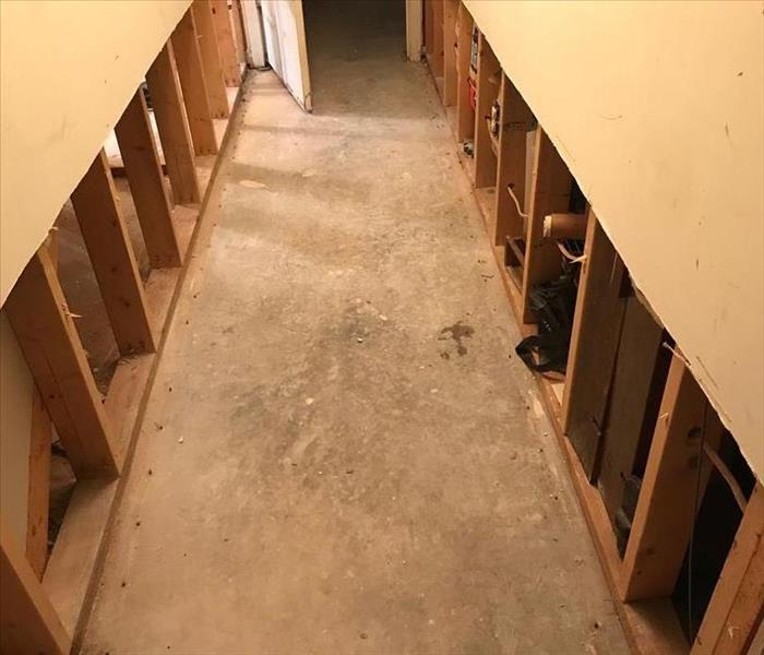 A clean hallway with the carpet removed