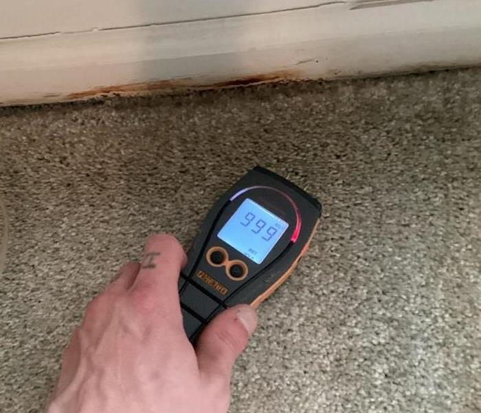 moisture level reading on floor being stabilized 