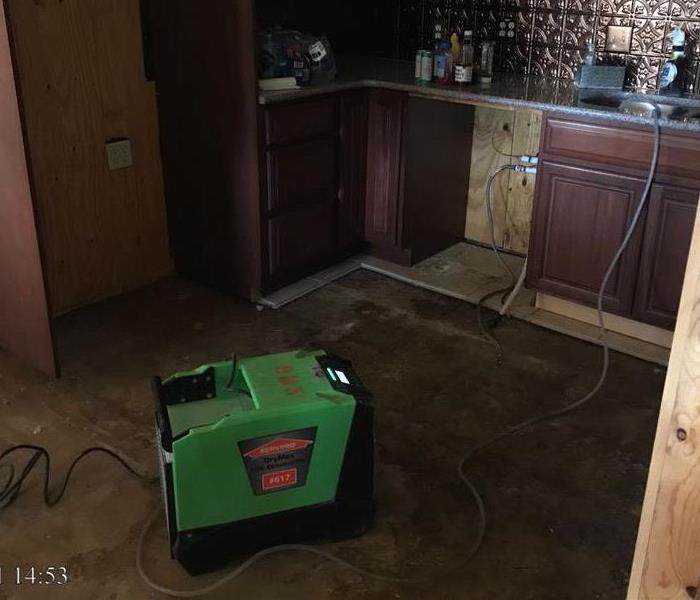 SERVPRO equipment in kitchen that has already had wet materials removed