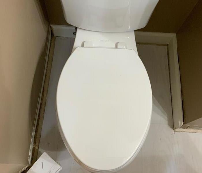 toilet that caused water damage in bathroom